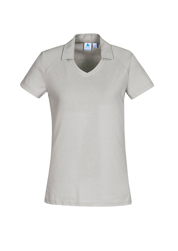 Image showing a woman in a Crest Cotton-Rich Women's Polo during a casual business event.