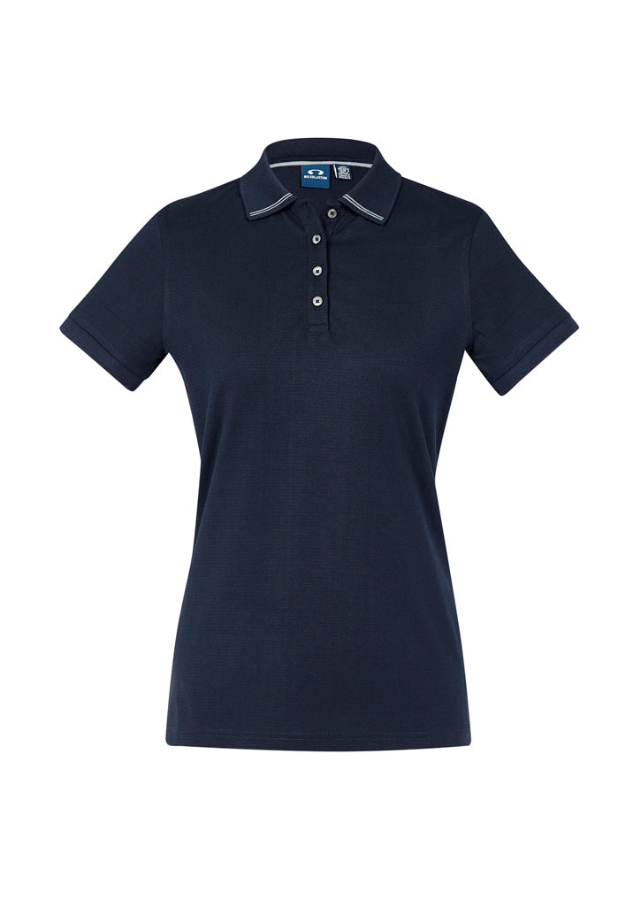 Image depicting a woman wearing an Athens Cotton Jersey Knit Women's Polo on a day out in the park.