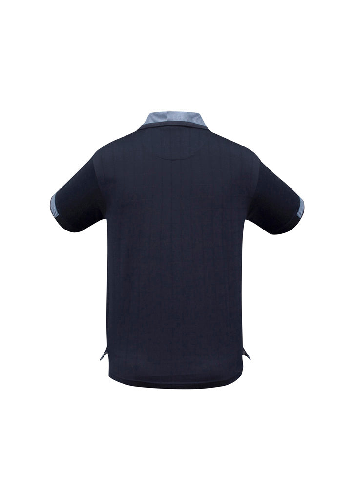 Image of a man wearing a Cole Self Check Fabric Men's Polo in a corporate setting.