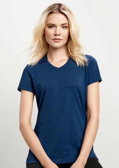 Image showing a woman in a Crest Cotton-Rich Women's Polo during a casual business event.