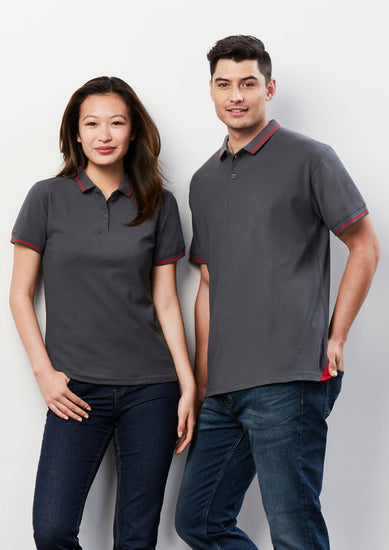 Image depicting a man in a Canvas Stripe Collar Men's Polo at a seaside resort.