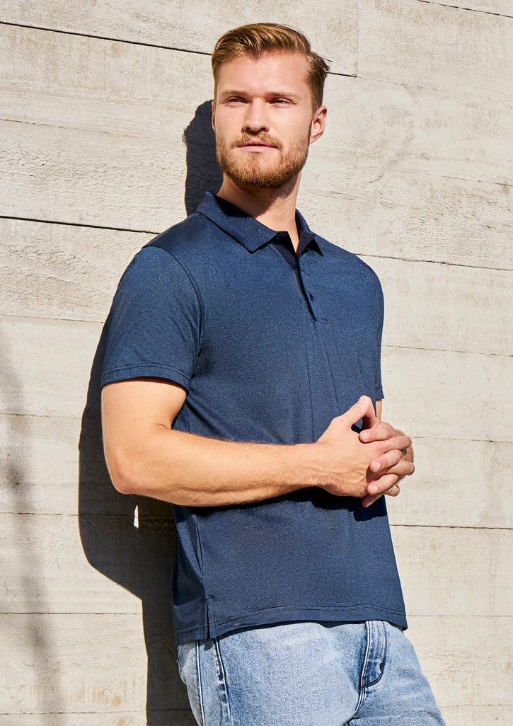 Image of a man in a Midnight Cross-Dyed Fabric Men's Polo at an evening social event.