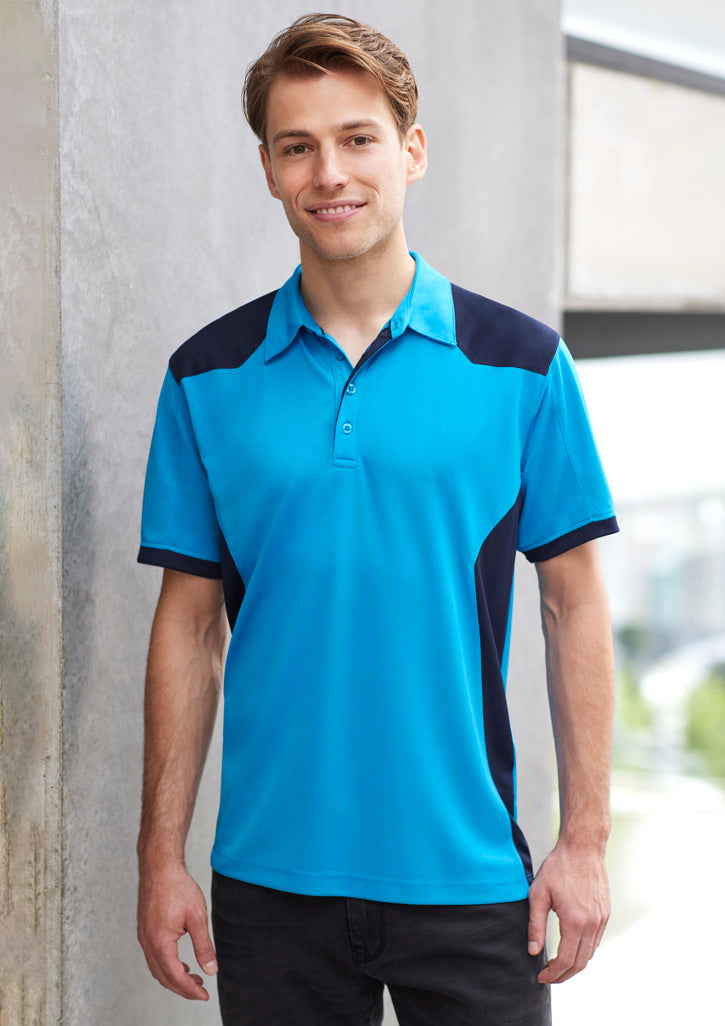Image of a man wearing a Sabo Loose Pocket Men's Polo in a relaxed setting.